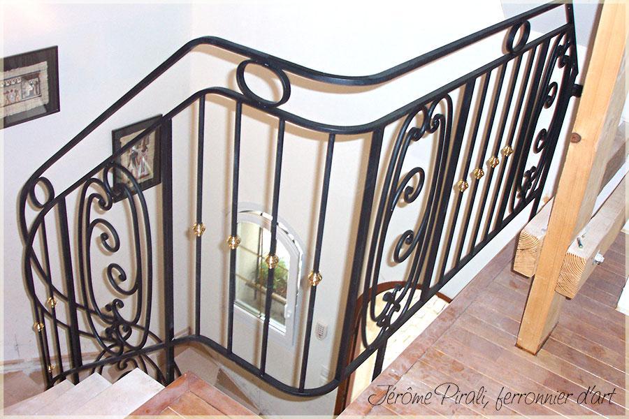 Rampe escalier fer forgé motifs maccarons